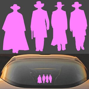 May include: Pink silhouette decal of four figures in cowboy hats and long coats, reminiscent of a Western film. The decal is shown on a car's rear window, offering a unique decorative touch.
