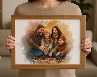 May include: A framed family portrait with a watercolor effect. The image features a smiling family of four, dressed in warm clothing. The frame is made of wood. The text "Until we meet again" is written in cursive at the bottom of the image.