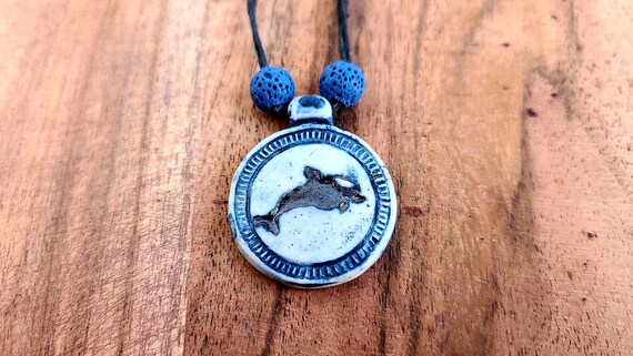 Collana con ciondolo a forma di pesce in acciaio