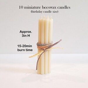 May include: Ten small, natural beeswax candles bundled together with twine. The candles are approximately 3 inches tall and have a burn time of 15-20 minutes.  They are the size of birthday candles.
