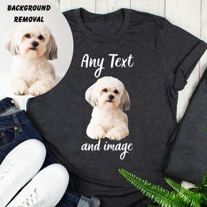 a black t-shirt with a white dog image and the text "Any Text and image" printed on it.