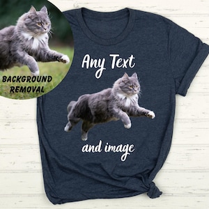 A gray cat is depicted in mid-leap on a dark blue t-shirt, with the text "Any Text and image" overlaid on the image.