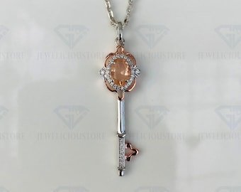 Enchanted Disney Aurora Oval Morganite and 1/10 CT. T.W. Diamond Key Pendant in Sterling Silver and 10K Rose Gold Plated With 18 Inch Chain