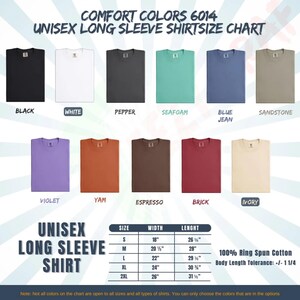 May include: A Comfort Colors 6014 unisex long sleeve shirt size chart displaying eleven color swatches including black, white, pepper, seafoam, blue jean, sandstone, violet, yam, espresso, brick, and ivory, with a table listing sizes S to 2XL in inches.