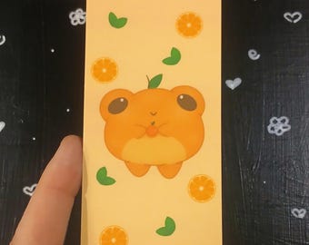 Marcador de rana de fruta naranja