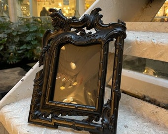 Antique French Bois durci frame circa 1880 with original curved glass and original wood back.