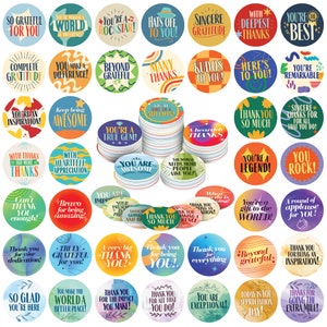 May include: A set of 36 colorful round stickers with positive messages and phrases like "You're a Rockstar!" and "Thank You for Being You!" The stickers are perfect for teachers, parents, or anyone who wants to spread positivity.