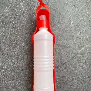 Botella de agua portátil para mascotas: diseño apretable de 500 ml