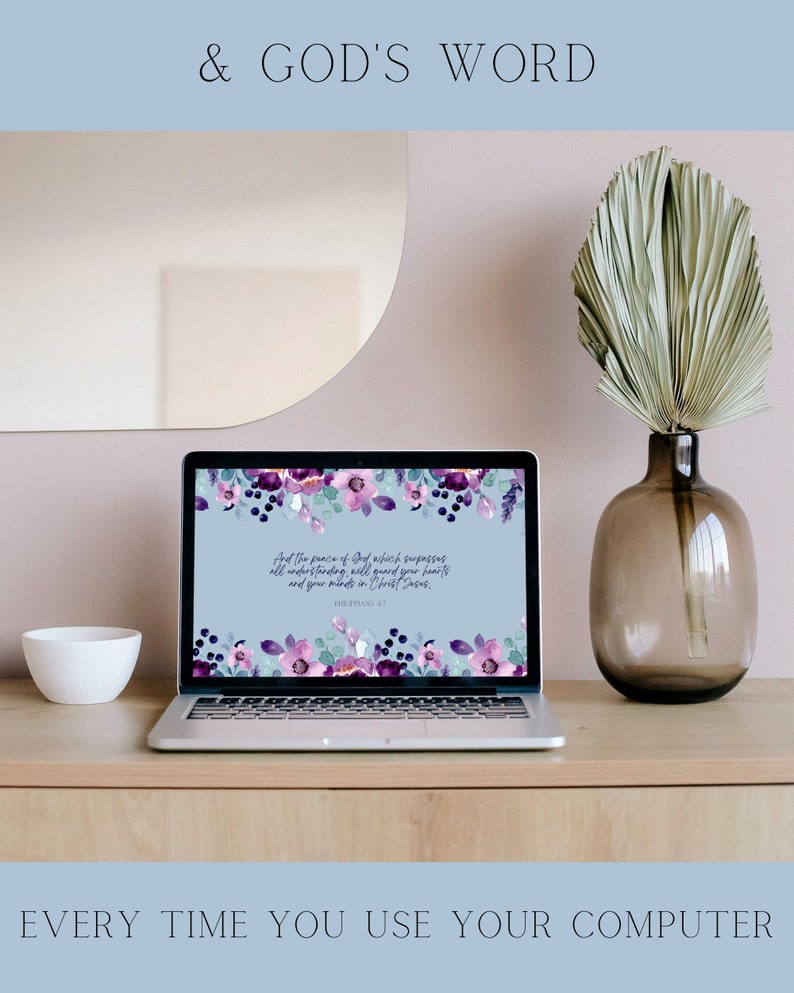 May include: A laptop computer with a floral wallpaper featuring purple and blue flowers. The screen displays a Bible verse: "And the peace of God which surpasses all understanding will guard your hearts and your minds in Christ Jesus." Philippians 4:7