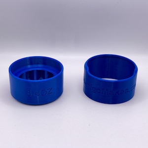 May include: Two blue 3D printed plastic rings. One ring is labeled "8/4 OZ" and the other ring is labeled "RigoMakes.com".
