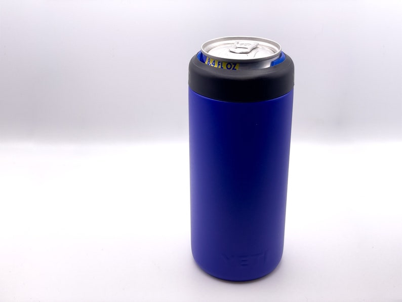 May include: A blue Yeti Rambler 12 oz. can cooler with a black lid. The can cooler is made of stainless steel and has a double-wall vacuum insulation to keep drinks cold or hot for hours.