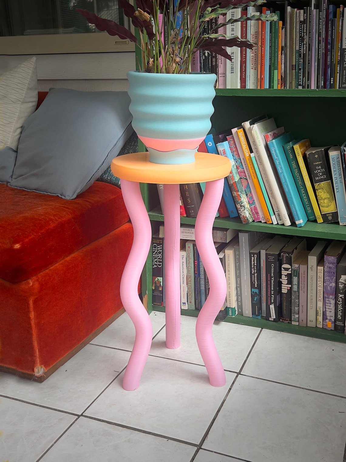 Wavy pink and peach side table from Etsy, inspired by maximalist design trends