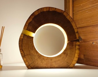 A lamp made of oak slices with a dimming and brightening function