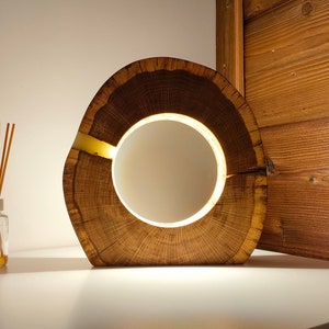 A lamp made of oak slices with a dimming and brightening function