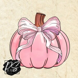 May include: A pink pumpkin with a large pink bow. The pumpkin is a fall decoration.