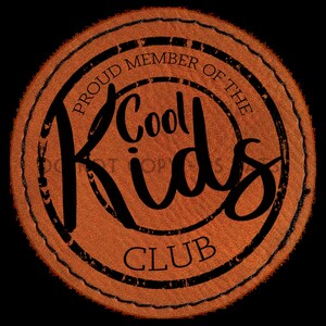 May include: A brown leather patch with a black circle and the text "Proud Member of the Cool Kids Club".
