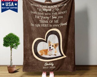 May include: A brown fleece blanket featuring a heart-shaped design with a corgi dog inside. The blanket has text that reads "When Tomorrow Starts Without Me..." and the name "Buddy" with dates.