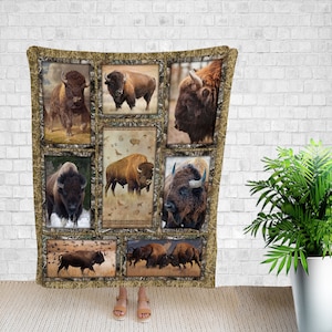 May include: A brown and tan fleece blanket with a collage of images of American bison. The images are arranged in a grid pattern and are surrounded by a camouflage-like pattern.