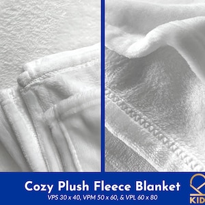 May include: A white plush fleece blanket folded in half. The blanket is soft and cozy, perfect for snuggling up on the couch.