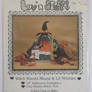 May include: A sewing pattern for a witch mouse and witchies. The pattern includes instructions for making a 12-inch Halloween centerpiece and a cute kitchen witch. The pattern is titled "Witch Wanda Mouse & Lil' Witchies" and includes the text "A Real Treat to Make!"