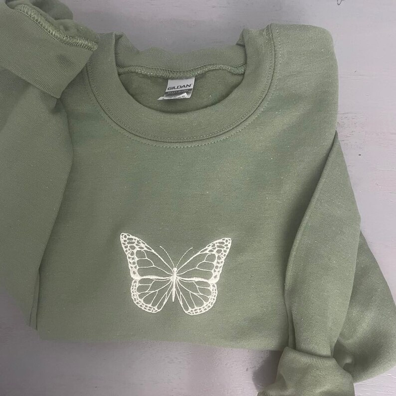 Butterfly and letter embroidered drop shoulder sweatshirt Clearance