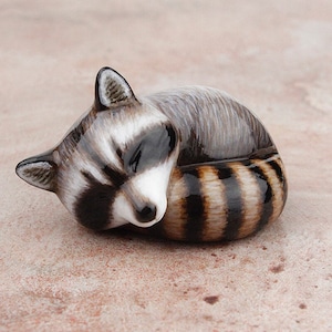 Sleeping raccoon - handmade animal figurine