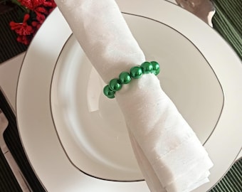 Servilletero verde navideño, juego de servilleteros navideños, servilletero con cuentas, decoración para mesas de fiesta, decoración para cenas navideñas, idea de decoración para Papá Noel.