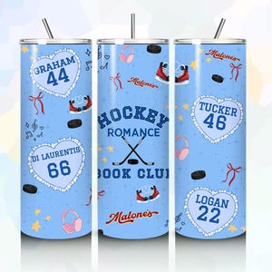 May include: A light blue cylindrical tumbler with a straw, featuring a repeating pattern of hockey-themed graphics, including hockey sticks, pucks, skates, headphones, and hearts with the names Graham 44, Di Laurentis 66, Tucker 46, and Logan 22.