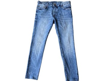 Jean skinny bleu Tony True Religion.  Pointure 32