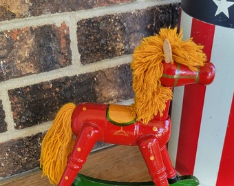 Little Red and orange polka-dots Wooden Rocking Horse with green Rocker.