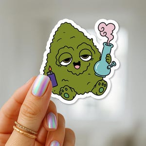 May include: A die-cut sticker featuring a cartoon character shaped like a green cannabis bud with a smiling face and droopy eyes. The character holds a light blue water pipe with pink smoke rising from it and a small purple lighter in its hand.