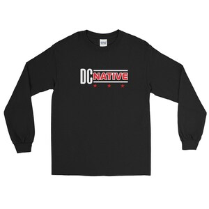 May include: Black long-sleeved t-shirt with a white graphic that says "DCNATIVE" in red letters with three red stars underneath.