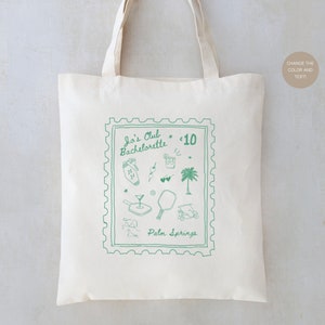 May include: A white tote bag with a green stamp design featuring the text "Jo's Club Bachelorette * $10" and "Palm Springs".