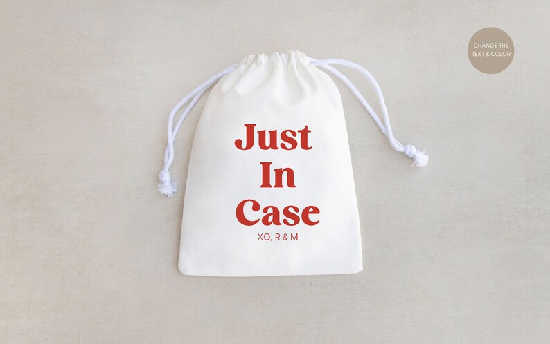 May include: White drawstring bag with the text "Just In Case" in red lettering. The bag has a white drawstring and is made of a soft, natural fabric.