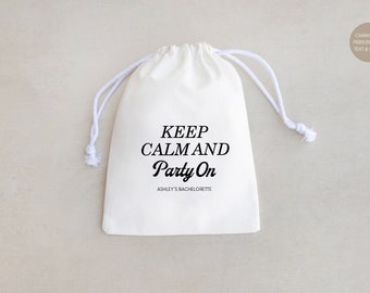 May include: White cotton drawstring bag with black text that reads "Keep Calm and Party On" and "Ashley's Bachelorette".
