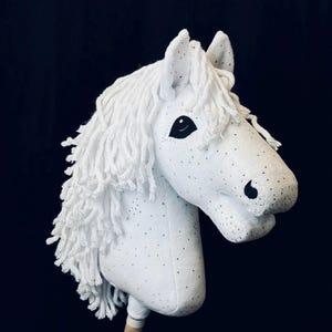 Hobby Horse A4 or A3 with detachable stick. Speckled gray and white.