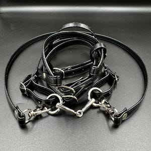Superb leather bridle with reins and realistic bit for an A4 / A3 hobby horse. Black.