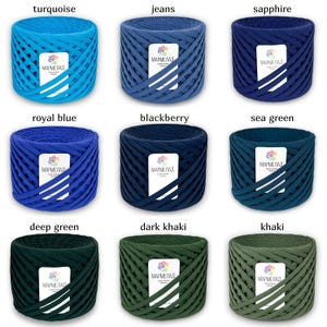 May include: Nine spools of cotton rope yarn in various shades of blue and green. The spools are labeled with the color name and the brand name "МАРМЕЛАД".