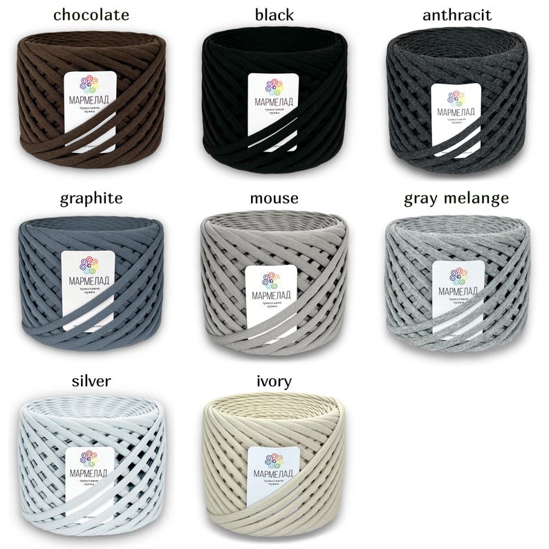May include: Nine spools of thick cotton cord in various colors, including chocolate, black, anthracite, graphite, mouse, gray melange, silver, and ivory. Each spool has a label with the word "МАРМЕЛАД" in Cyrillic script.