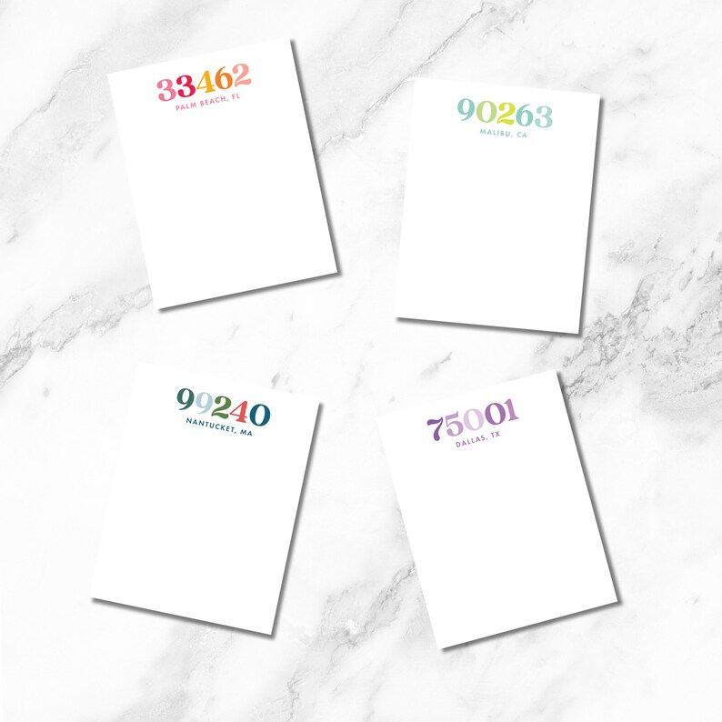 May include: Four white notepad sets with colourful numbers and city names. The numbers are 33462, 90263, 99240, and 75001. The cities are Palm Beach, FL, Malibu, CA, Nantucket, MA, and Dallas, TX.