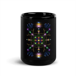 May include: Black ceramic mug with a colorful geometric design featuring a central star shape with radiating lines and glowing lights.