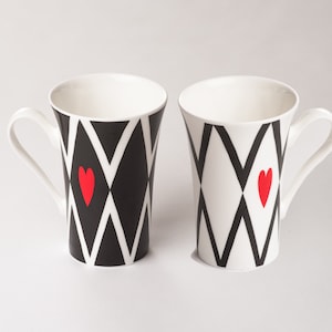 Gift set 2x elegant mugs, fine bone china, red love heart, black, white, dishwasher and microwave safe. Ideal for tea or coffee.