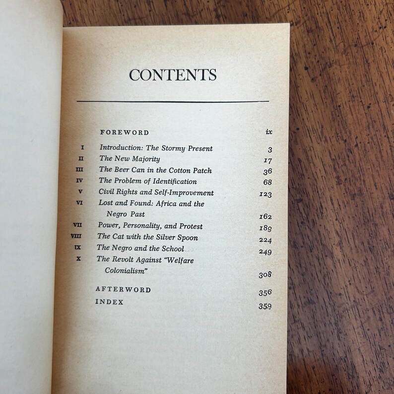 May include: A book page titled CONTENTS listing chapters from Foreword to Index. The text includes Introduction: The Stormy Present, The New Majority, The Beer Can in the Cotton Patch, The Problem of Identification, Civil Rights and Self-Improvement.