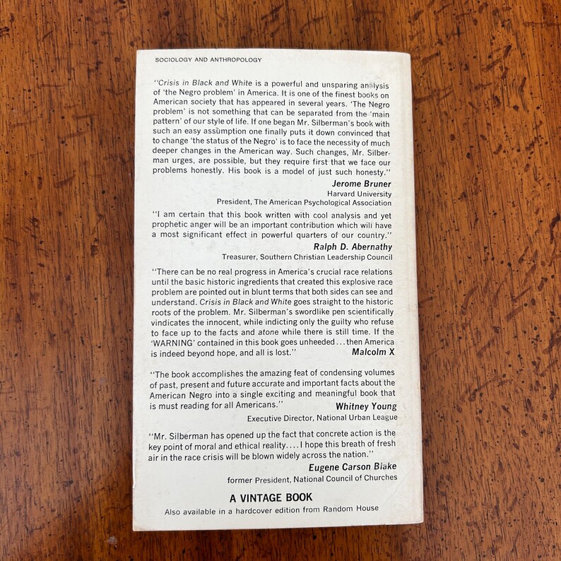 May include: A white paperback book cover with black text titled Sociology and Anthropology. The back cover features printed testimonials from Jerome Bruner, Ralph D. Abernathy, Malcolm X, and Whitney Young, with the text A VINTAGE BOOK at the bottom.