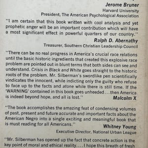 May include: A printed page featuring testimonials about the book Crisis in Black and White. It includes quotes from Jerome Bruner, Ralph D. Abernathy, and Whitney Young, with a mention of Malcolm X. The text is black on a light, off-white background.