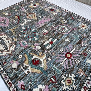 Handknotted large slate blue Oushak wool rug, 9'2 x 12 ft, dusty mauve and teal floral vine motifs with ivory floral border