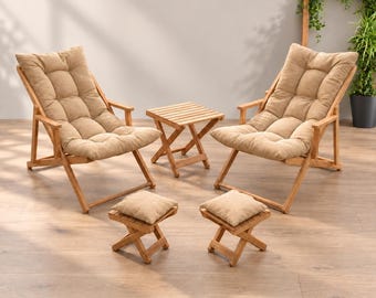 May include: A patio furniture set consisting of two wooden lounge chairs with tufted beige cushions, two matching wooden footstools with beige cushions, and a small square wooden side table with a slatted top, all arranged on a light wood floor.
