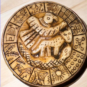 Peruvian Andean Incas&#39; Calendar with Andean Trilogy in High Relief Peruvian Inca calendar hand-carved on Andean alabaster stone. Shaman.