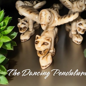 Andean Cosmology Totem: Andean Trilogy is made up by three sacred animals, condor, puma, and snake. Handmade in Peru.