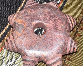 Andean 8 pointed Jawaya (meteorite) star, handmade from Peru. 8 pointed star is a symbol of life, fertility and wards against evil.